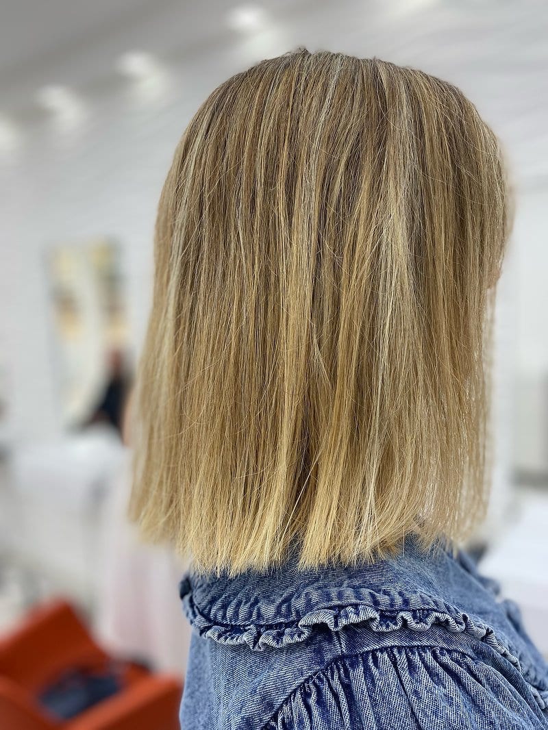 Blunt blonde bob with soft highlights